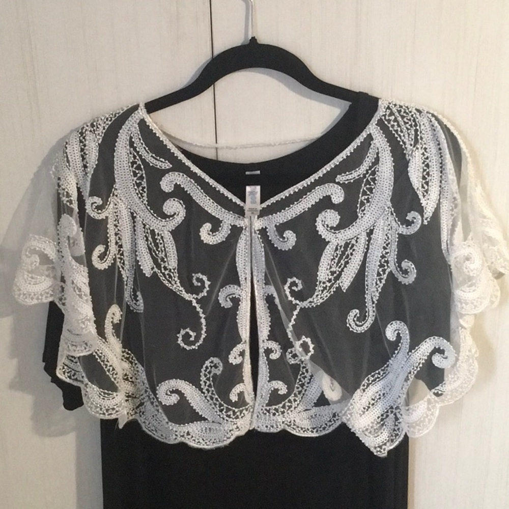 Beautiful white beaded mini cape